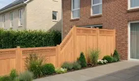 Holzzaunfelder Neuenburg mit senkrechter Nut-Feder-Füllung und Rankgitter, als Sichtschutz an Terrasse und Haus im Garten