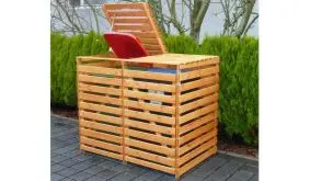 Unsere Mülltonnenverkleidung "Kemi" aus massivem Kiefernholz. In der Farbe: Honigbraun