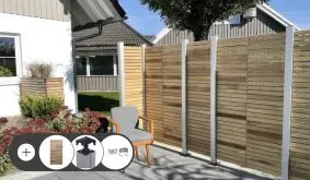 Rhombus Sichtschutzzaun aus Robinie mit Alu Zaunpfosten an der Terrasse. Im Set enthalten sind Zaunelemente, Alu Zaunpfosten, Montagesets und beim Aufschrauben Pfostenträger mit Bolzenankern.