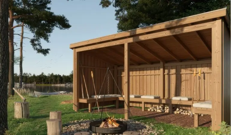 Rustikaler 432 x 218 cm Grillunterstand aus nordischem Nadelholz mit Pultdach, offener Front und fest montierten Sitzbänken. Nutzfläche: 9,5 qm